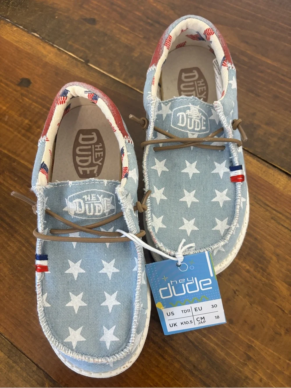 Hey Dude Kids Light Blue Star Slip-Ons with Red Accents